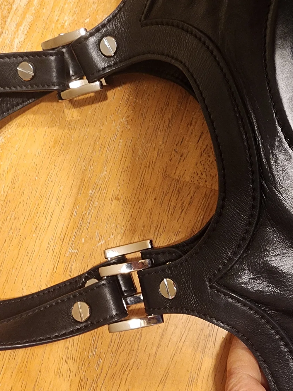 Tory Burch Classic Bombe tote handbag With embossed logo on a black leather Tote